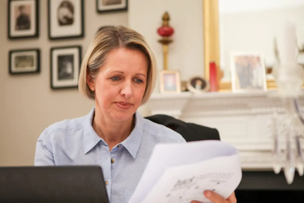 woman-reviewing-franchise-business-paperwork