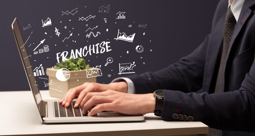 franchise-wording-man-on-laptop